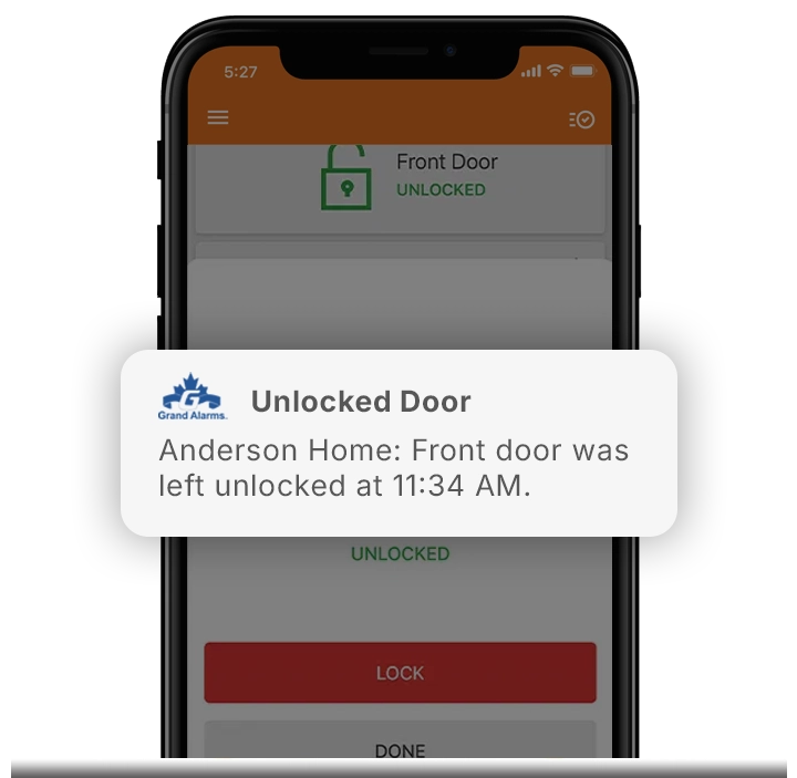 Homeowner using the Grand Alarms app to unlock a door remotely for a visitor at an Uxbridge home